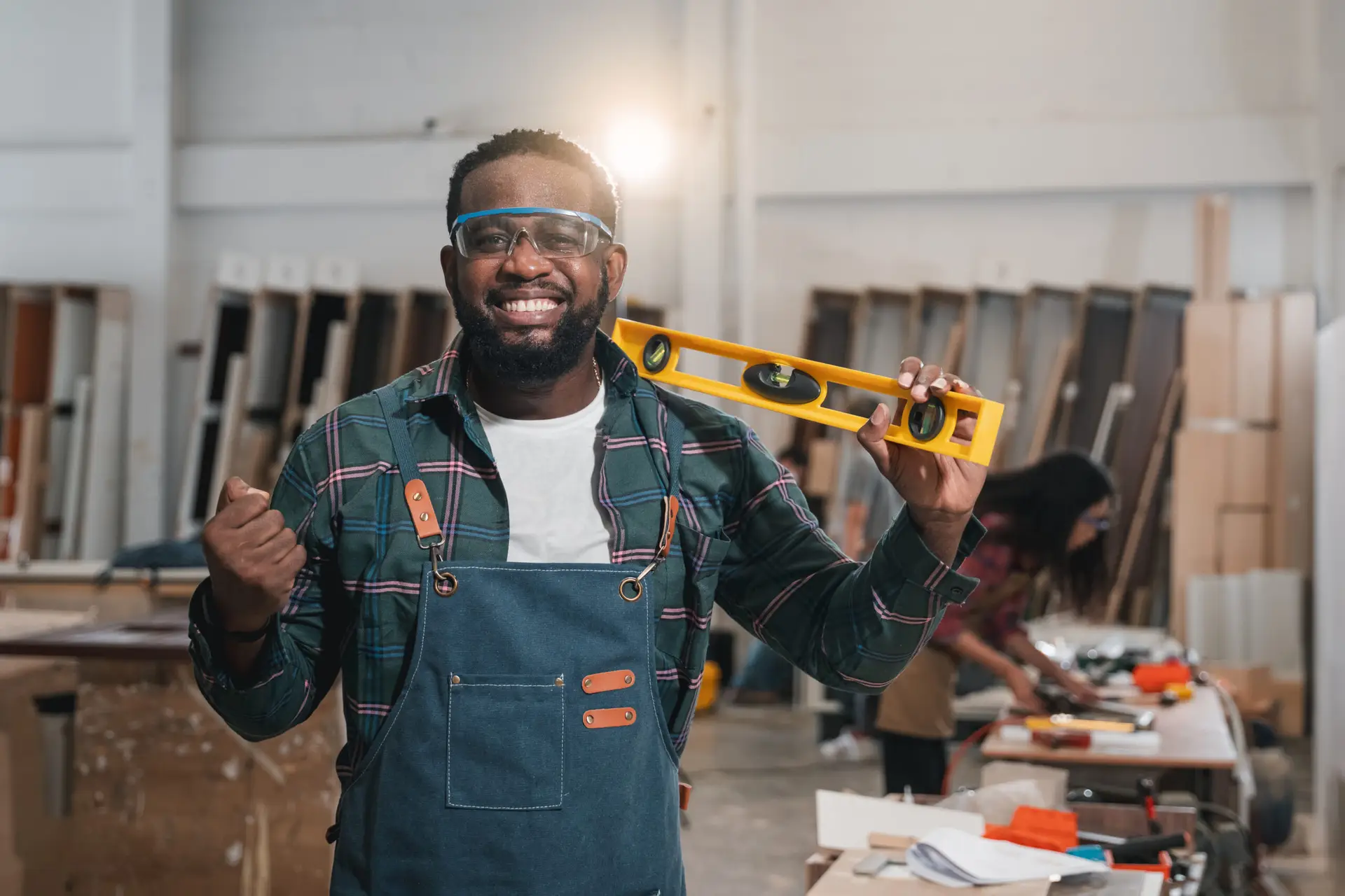Skilled tradesperson working with tools in a workshop